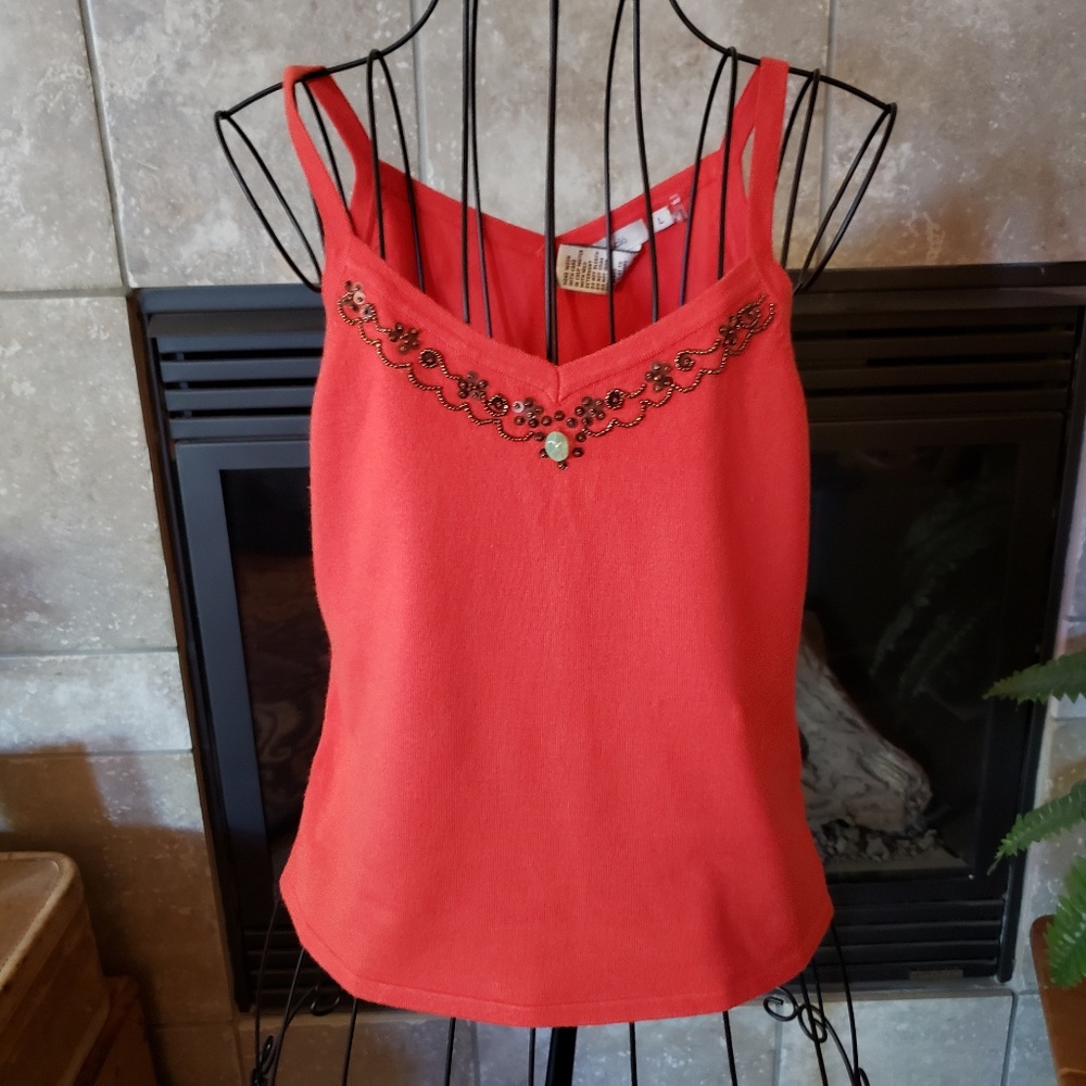 Very cute orange top with bead embellishments